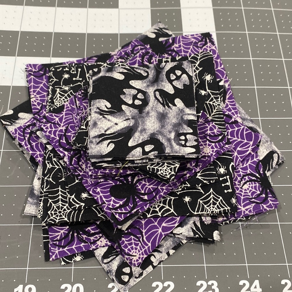 Halloween themed cut fabric squares